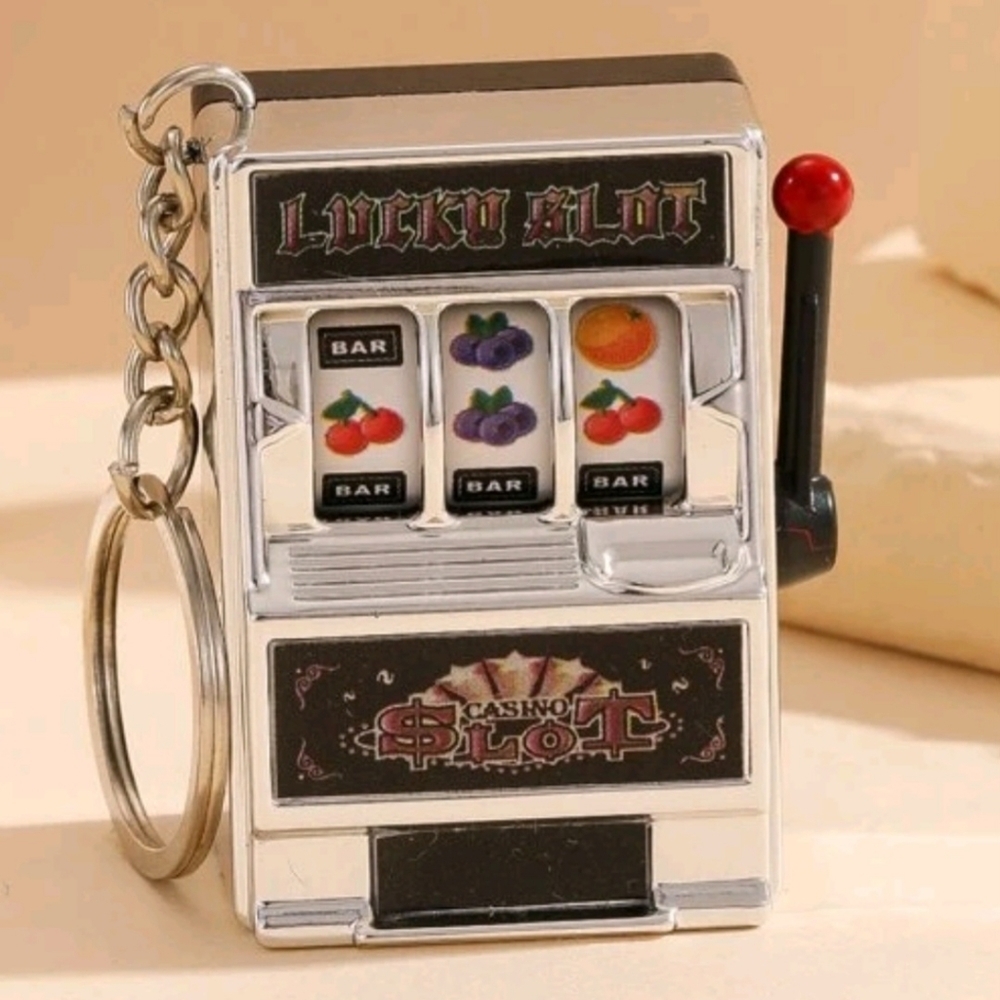 Game Machine Toy "actually spins" 1.25" x 2" Keyring Purse Charm Silver or Black